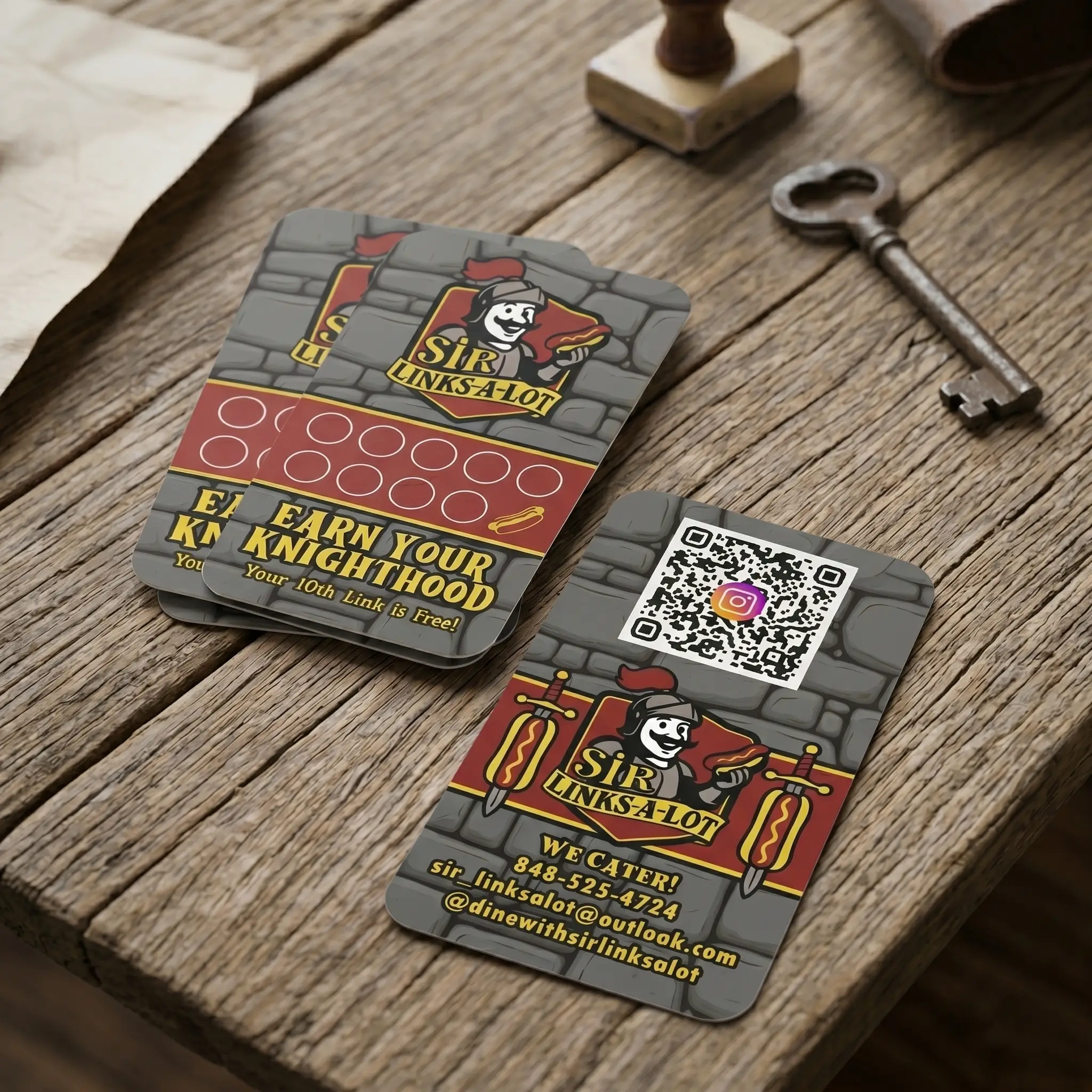Sir Links-A-Lot loyalty punch cards on a wooden table